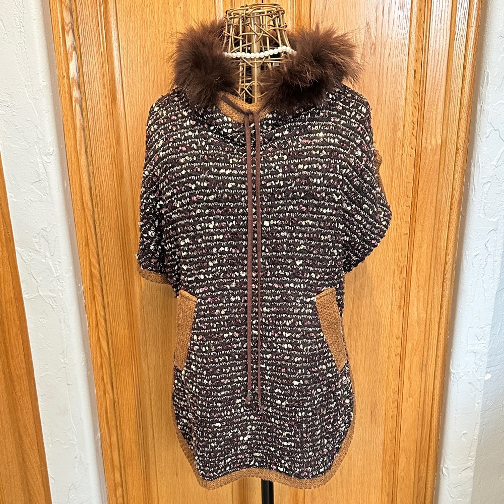 Brown Knit Poncho with Faux Fur Trim. Cream gold maroon silver ribbon texture